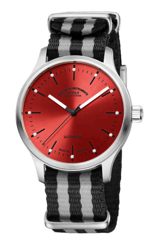Striking high end watch with bold red face and black & white accents.